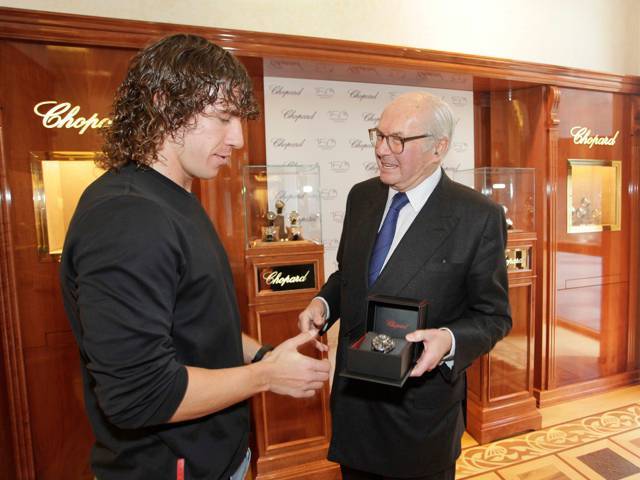 Karl Scheufele and FCB Captain Carlos Puyol