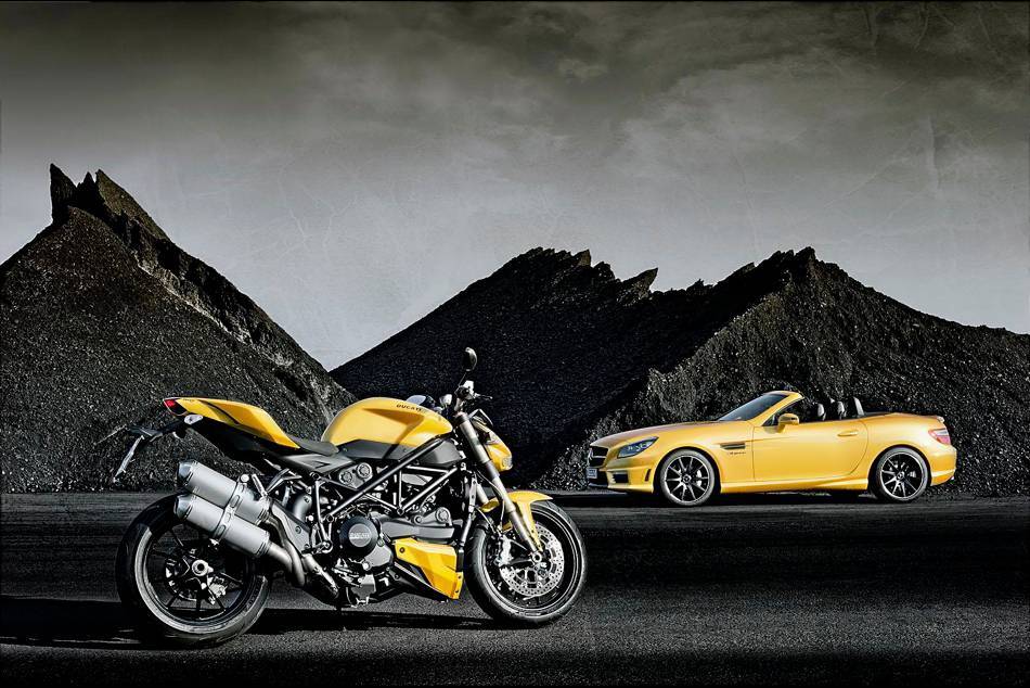 The SLK 55 AMG and Ducati 848 in "Streetfighter Yellow" on display at the Bologna Car Show